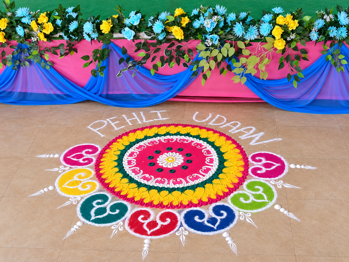 Pehli Udaan rangoli and decorated stage